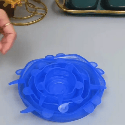 up Stop Wasting Plastic Wrap Every Day - Stretch, seal, and reuse. These silicone stretch lids help cover leftovers, half-cut fruit, bowls, cups, and jars in seconds — without fighting with messy disposable wrap.